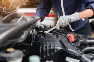 a mechanic works on auto maintenance and repair services
